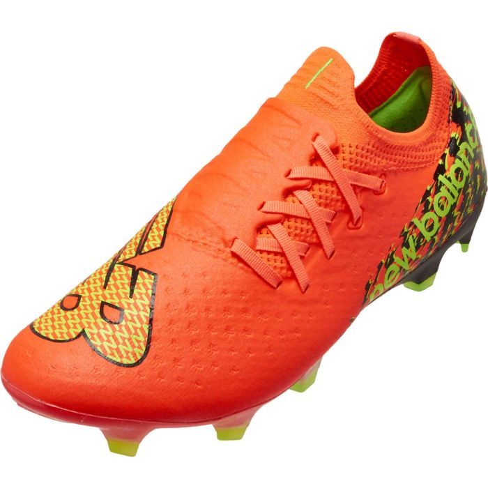 Black and orange new balance cleats best sale